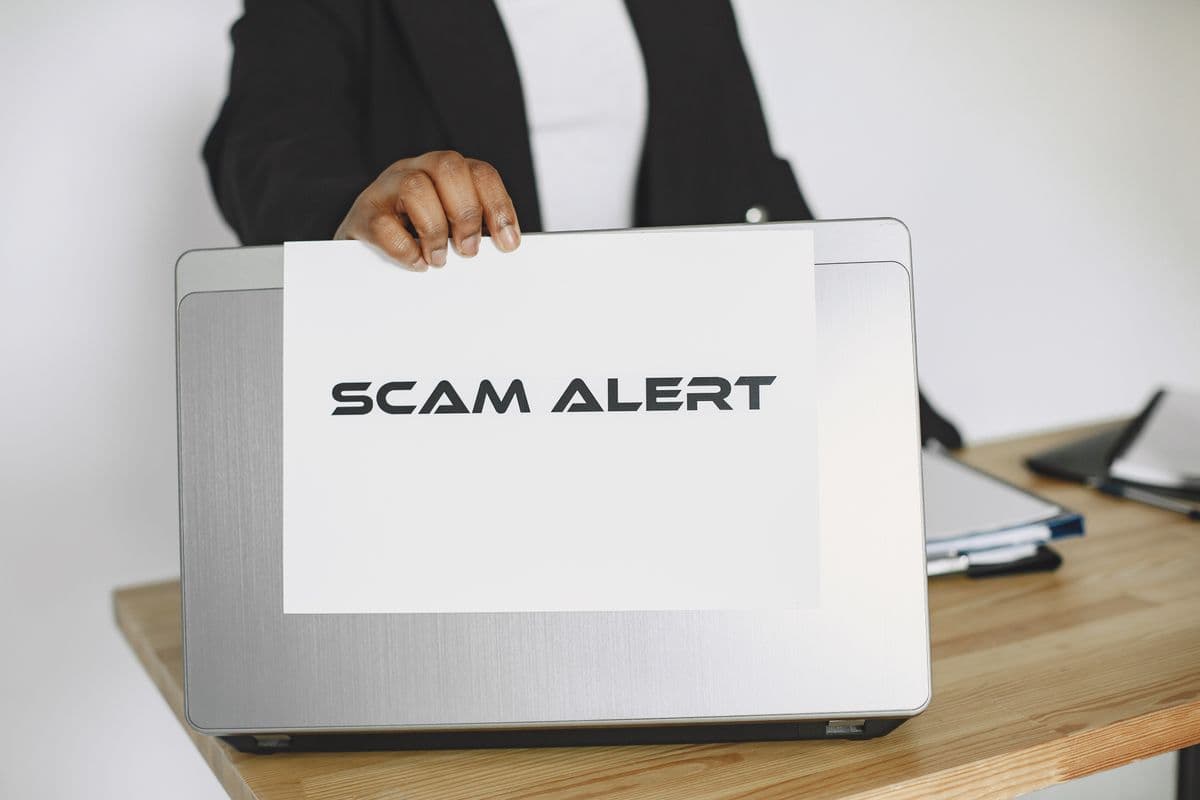 A scam warning on a screen